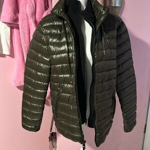 Calvin Klein puffer army green. Never worn.